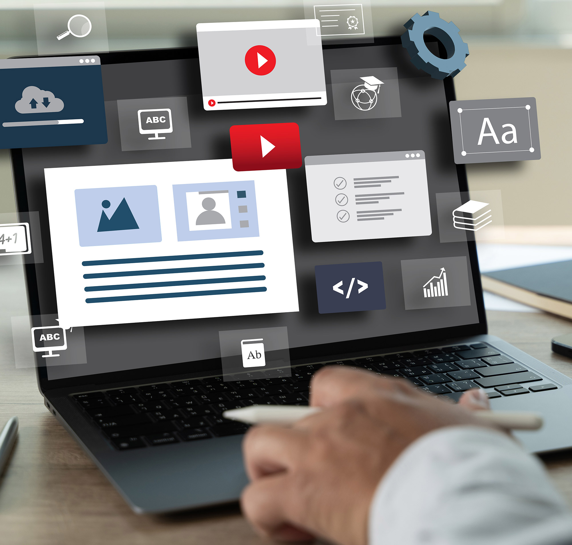 Ein Laptop zeigt verschiedene digitale Inhalte und Symbole für Medien, Text und Datenanalyse auf dem Bildschirm.