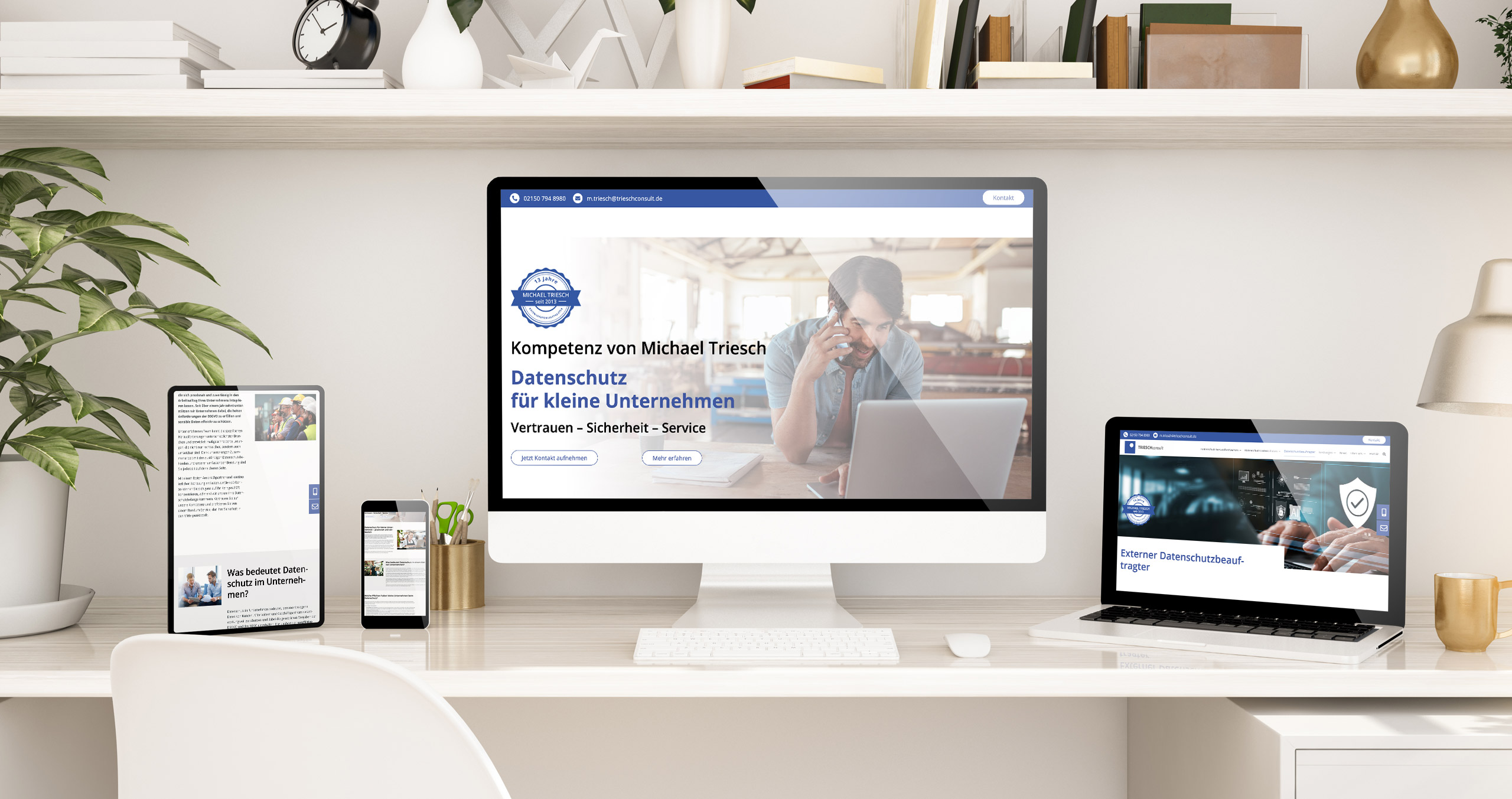Moderne Büroeinrichtung mit mehreren Geräten, die Datenschutzdienste für kleine Unternehmen anbieten.