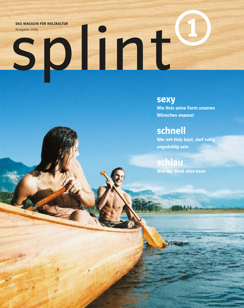 Titelblatt des Magazins splint mit einem Paar in einem Holzkanu auf einem See vor einer Bergkulisse unter blauem Himmel bei strahlendem Sonnenschein.